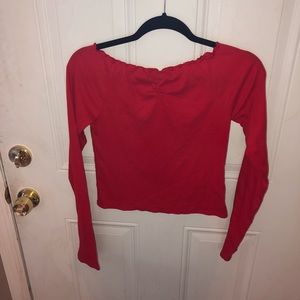 Red off the shoulder long sleeve shirt